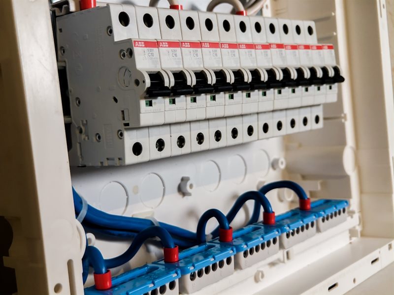 Electrician working on a panel
